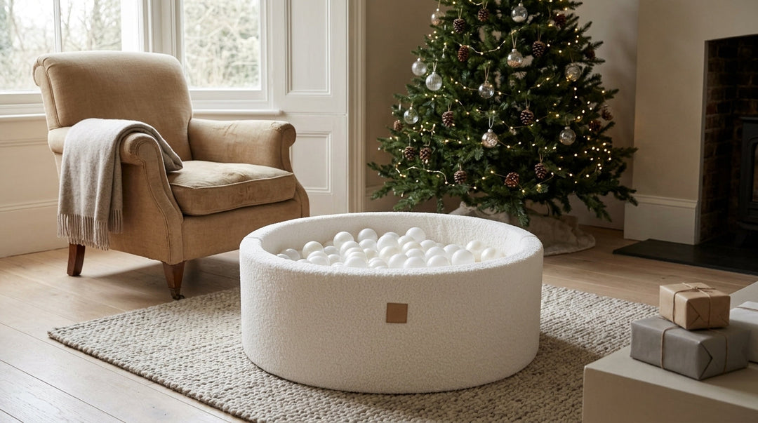 MeowBaby White Boucle Round Ball Pit in a sitting room decorated for Christmas