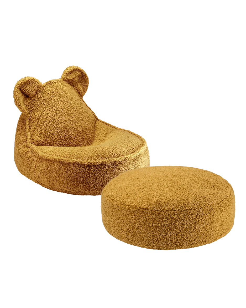 Ivory Wigiwama bear chair and coordinating cream round ottoman isolated view