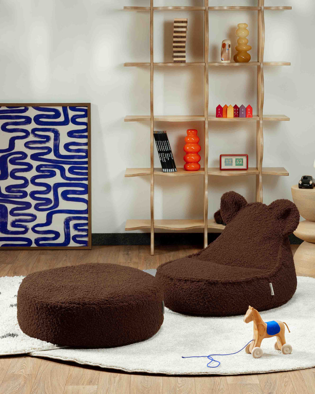 Deep brown Wigiwama bear-shaped beanbag with round ottoman, product view