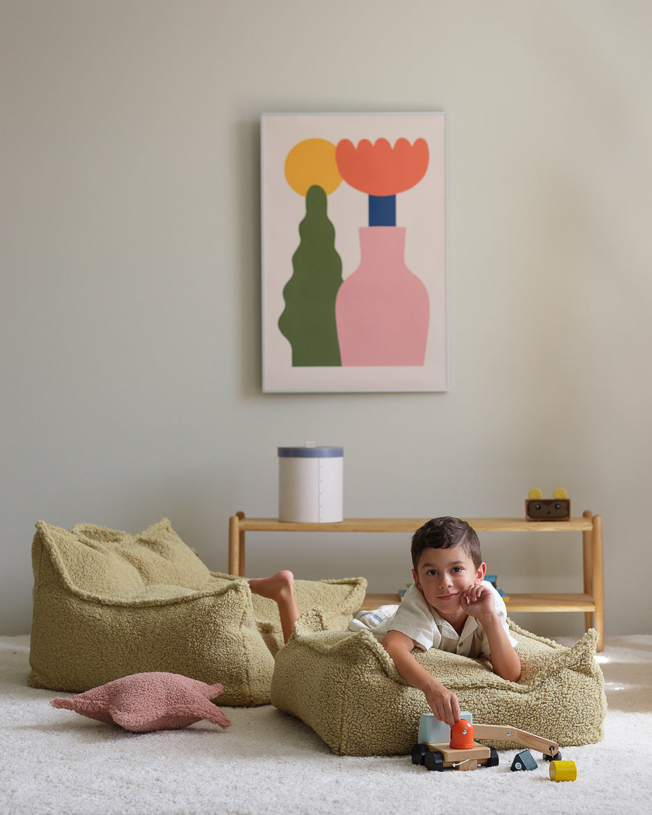 Pink Wigiwama beanbag set with ottoman styled with décor and yellow curtain backdrop