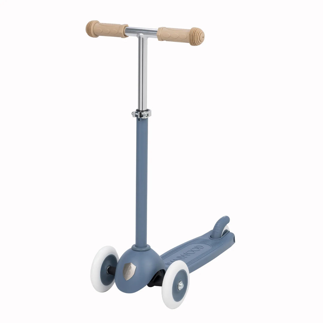 Side view of scooter showing wooden T-bar handlebar and adjustable height mechanism