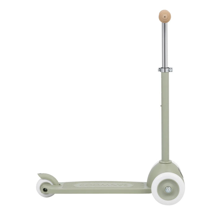 Overhead view of olive scooter showing three-wheel base and full deck layout