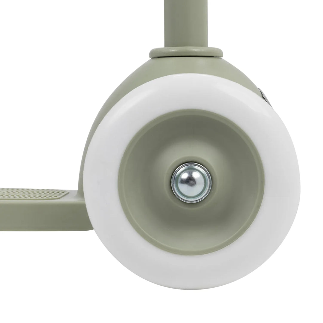 Rear wheel close-up showing white wheel, olive hub, and back brake assembly