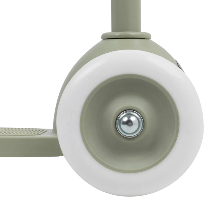 Rear wheel close-up showing white wheel, olive hub, and back brake assembly
