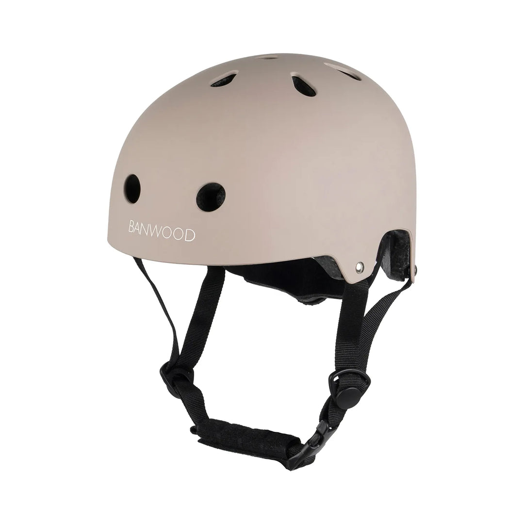 Matte beige safety helmet with black straps, front view Banwood