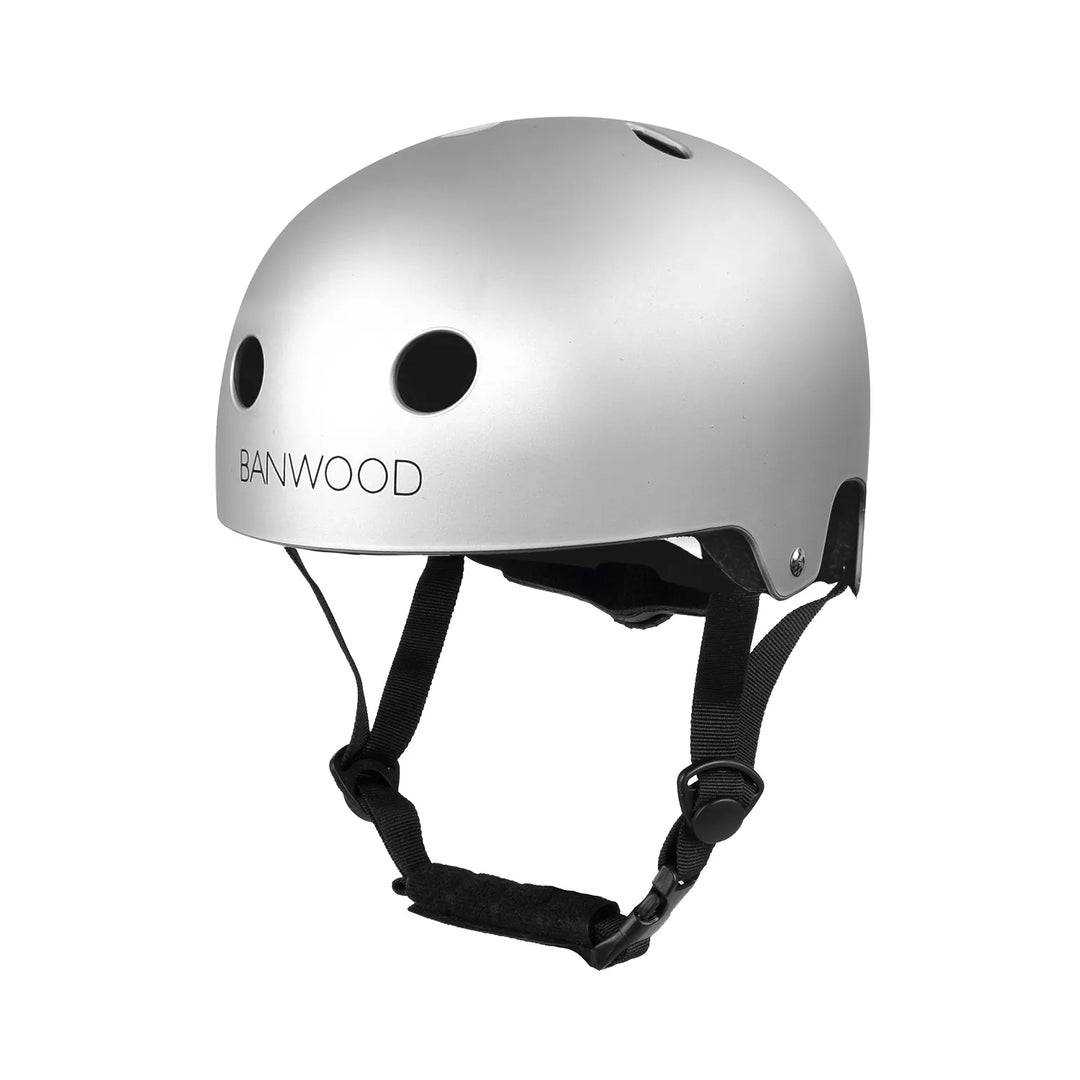 Silver Banwood helmet front view with black chin straps and ventilation holes