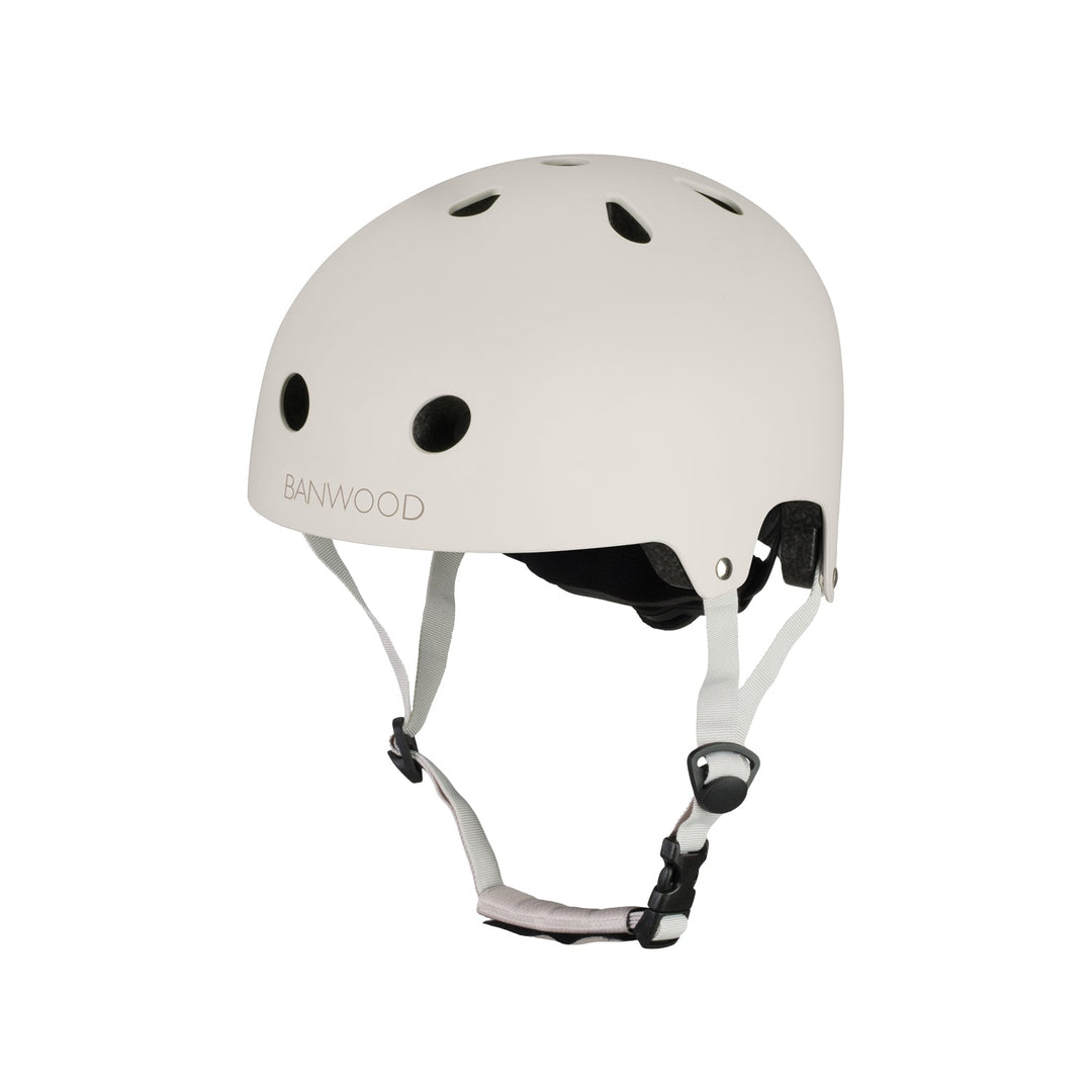 Cream Banwood helmet front view with ventilation holes and adjustable chin strap