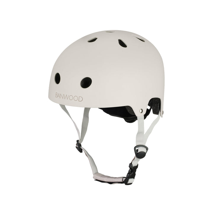 Cream Banwood helmet front view with ventilation holes and adjustable chin strap
