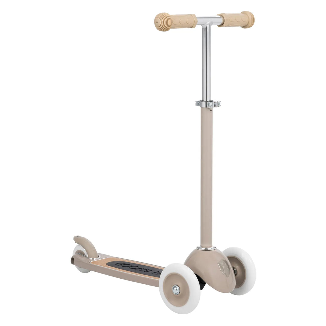 Beige scooter with straight handlebar, no basket attached, side profile