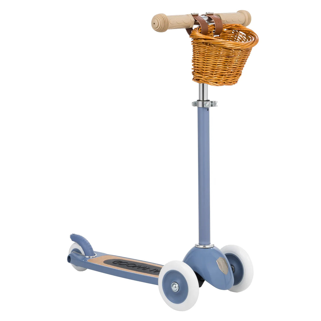 Blue three-wheel scooter with wicker basket and wooden handles, Banwood