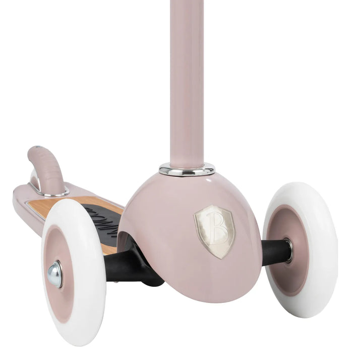 Underside view of Banwood scooter showing three wheels and oak deck branding