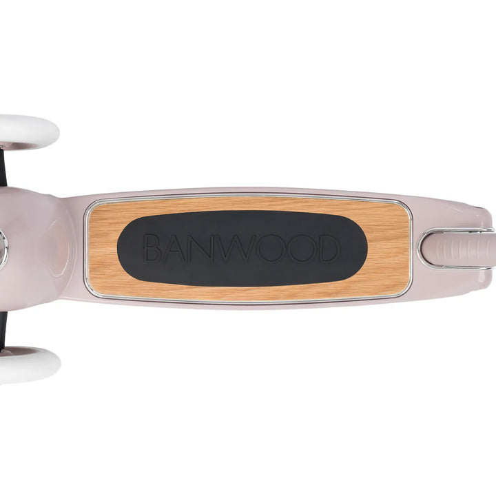 Top-down view of Banwood scooter deck branding and oak finish