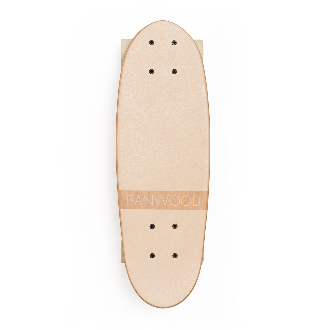 Cream Banwood skateboard deck viewed from above with grip tape mounting holes