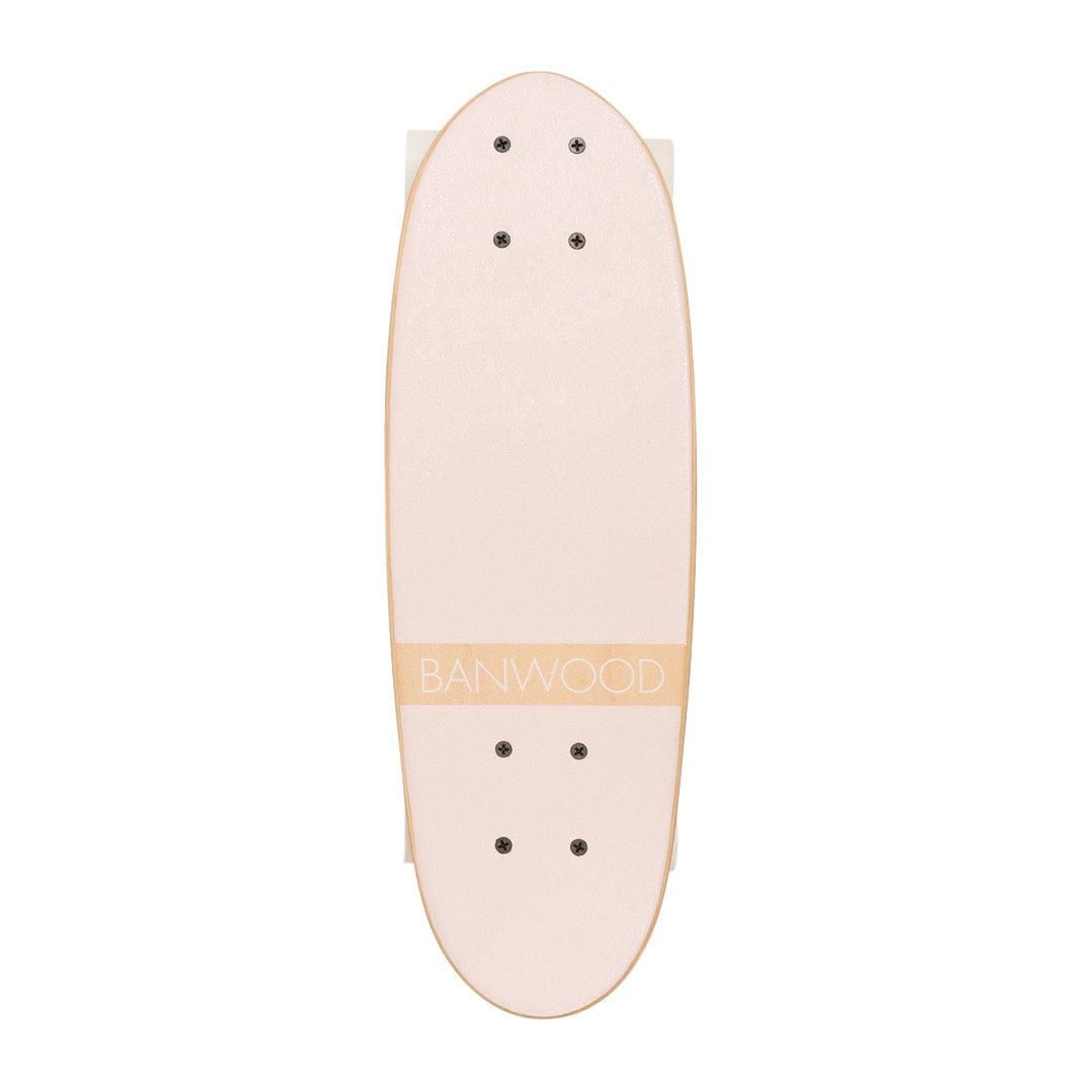 Pink skateboard deck top view with grip tape holes and BANWOOD logo