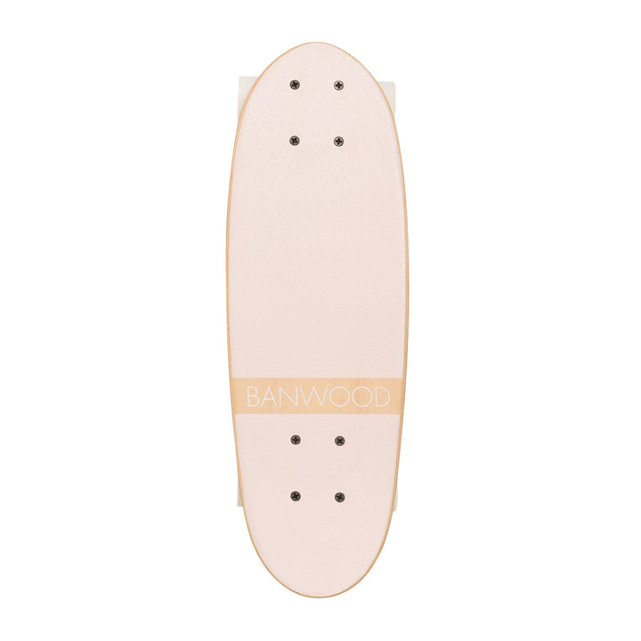 Pink skateboard deck top view with grip tape holes and BANWOOD logo