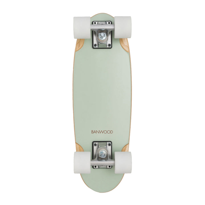 Assembled mint skateboard with white trucks and wheels, flat view