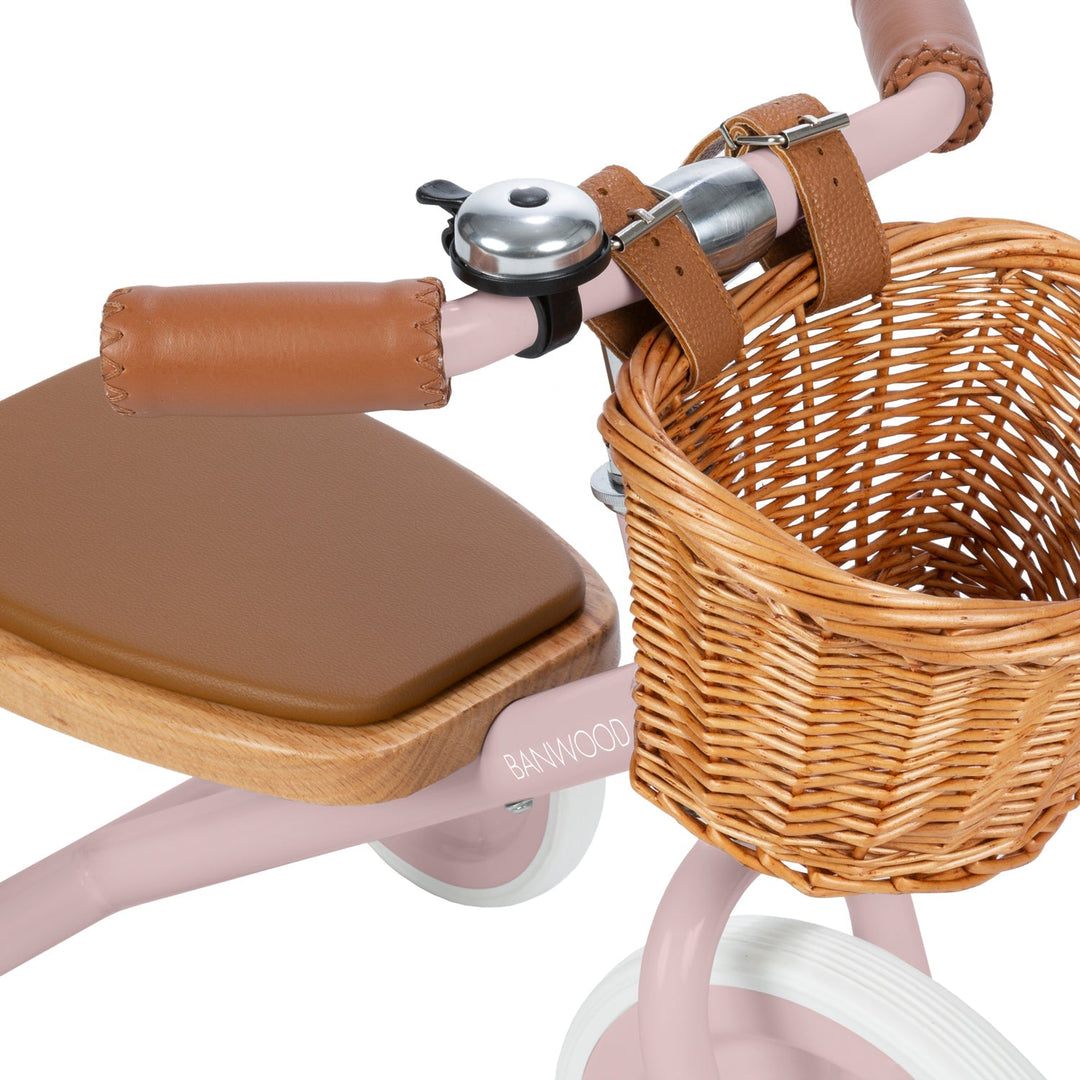Detail of padded leather seat with oak wood frame and dusty pink metal frame, Banwood