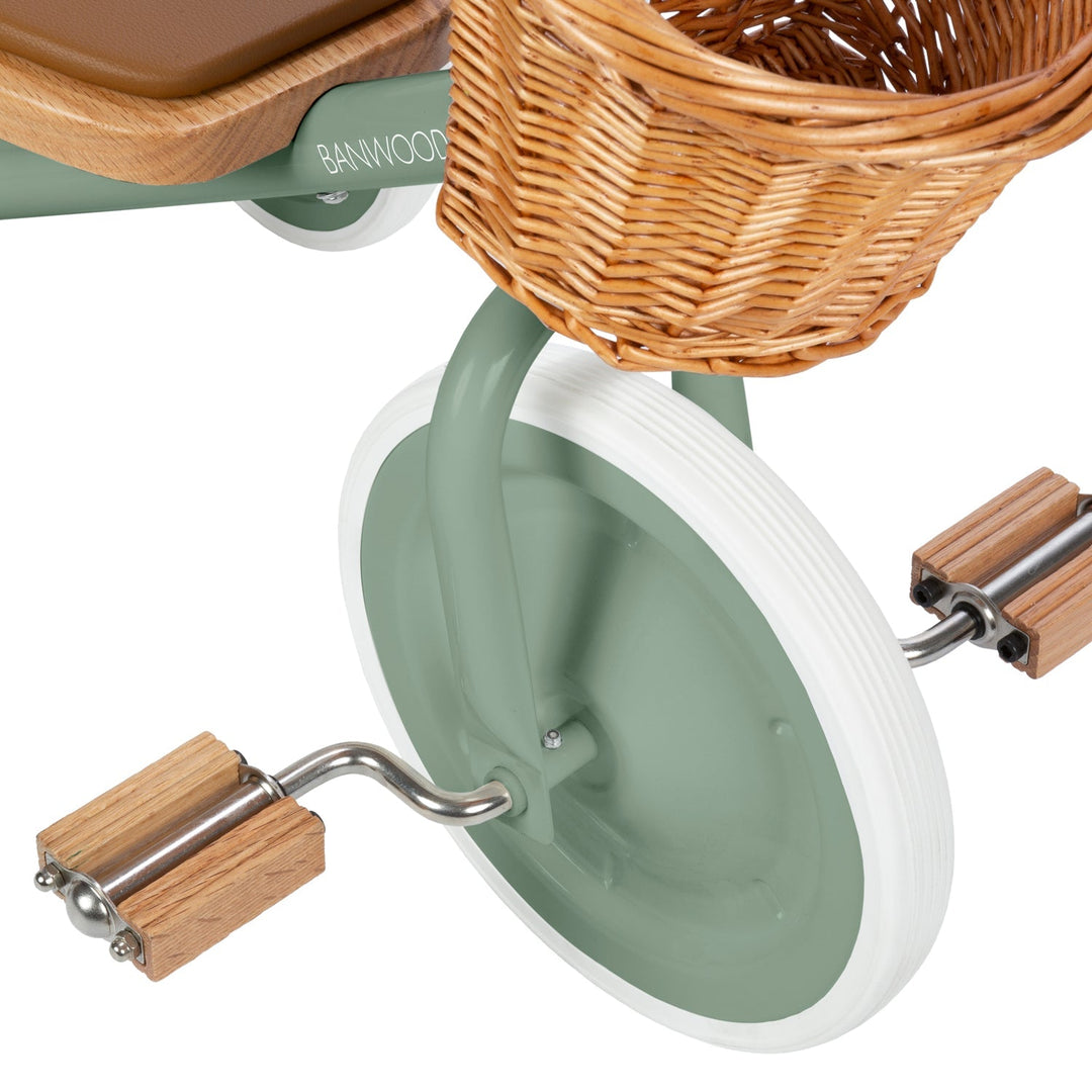 Close-up of oak pedals and wheel showing wooden construction and metal fixings