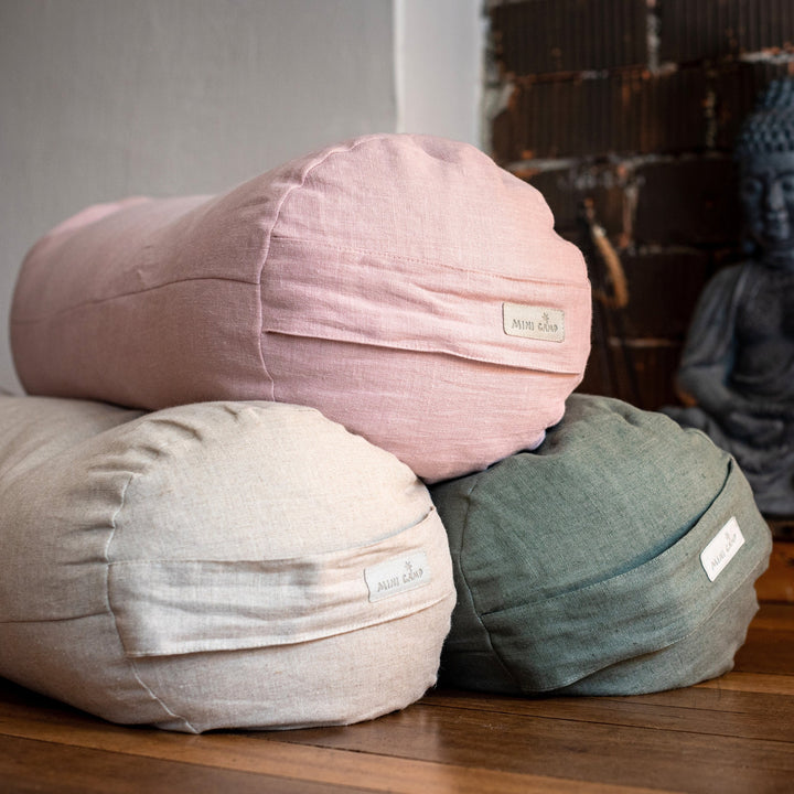 MINICAMP linen yoga bolsters shown together in Dusty Pink, Natural Color and Forest Green