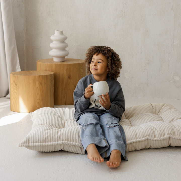MINICAMP ecru tufted floor cushion, close product view