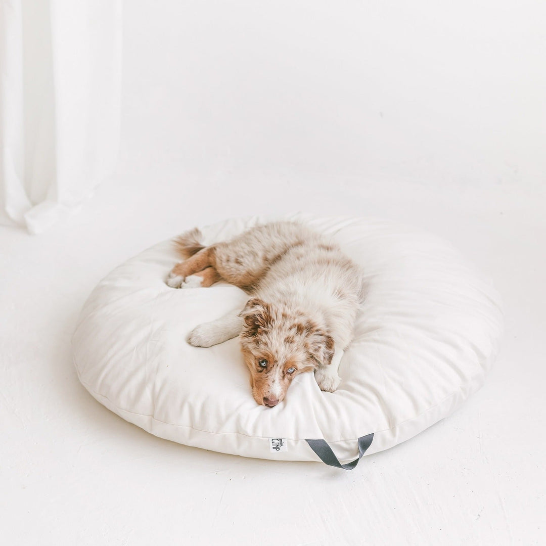 MINICAMP lounger floor pillow with handle, angled view