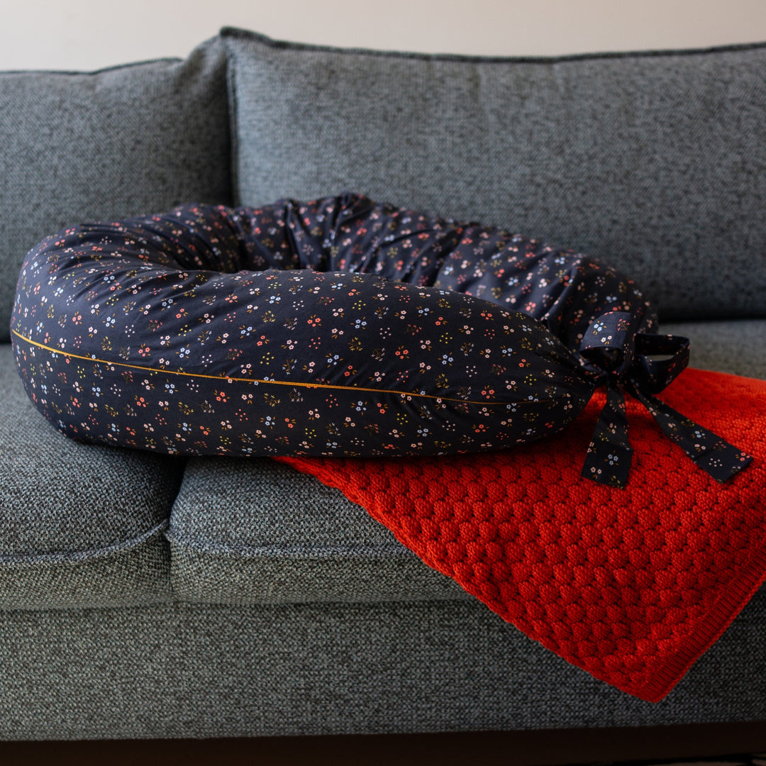 MINICAMP C-Shape Pillow, Navy Blue floral organic cotton cover, product photograph