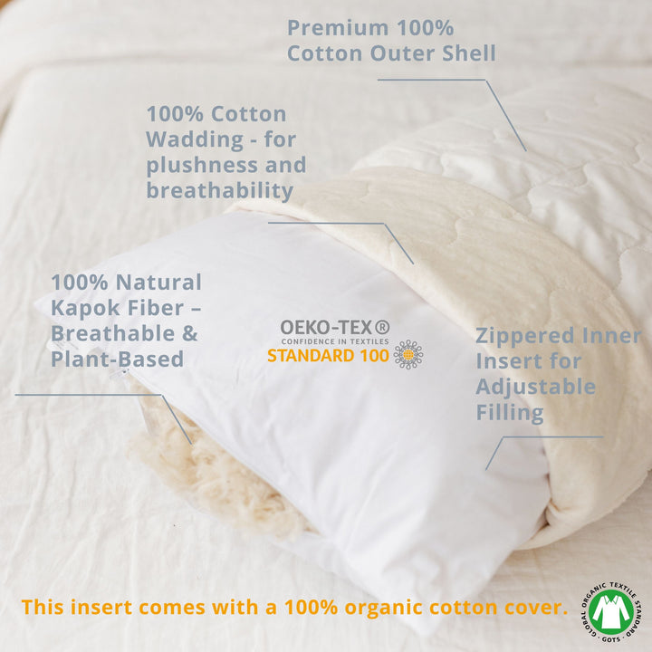 MINICAMP Full Body Pillow, Milk White floral organic cotton cover, styled on a bed