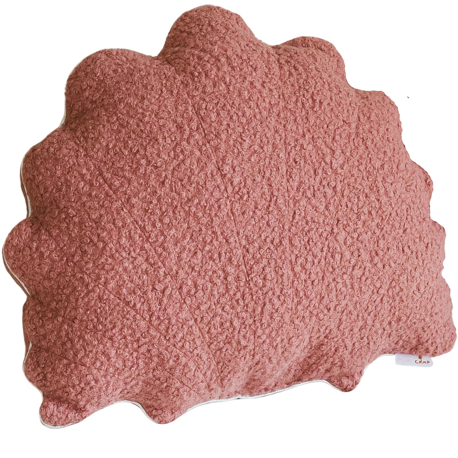 Rose bouclé seashell cushion with metallic trim, front view