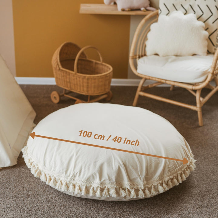 MINICAMP ecru tasselled floor cushion, top view