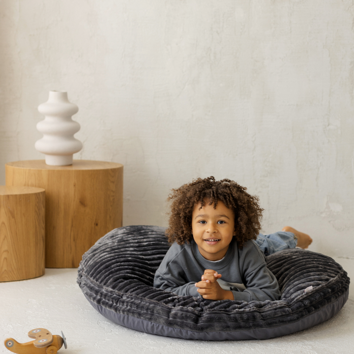 MINICAMP dark grey corduroy floor cushion, close-up of ribbed texture