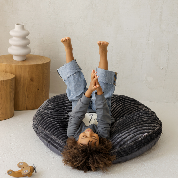 MINICAMP dark grey corduroy floor cushion, angled view