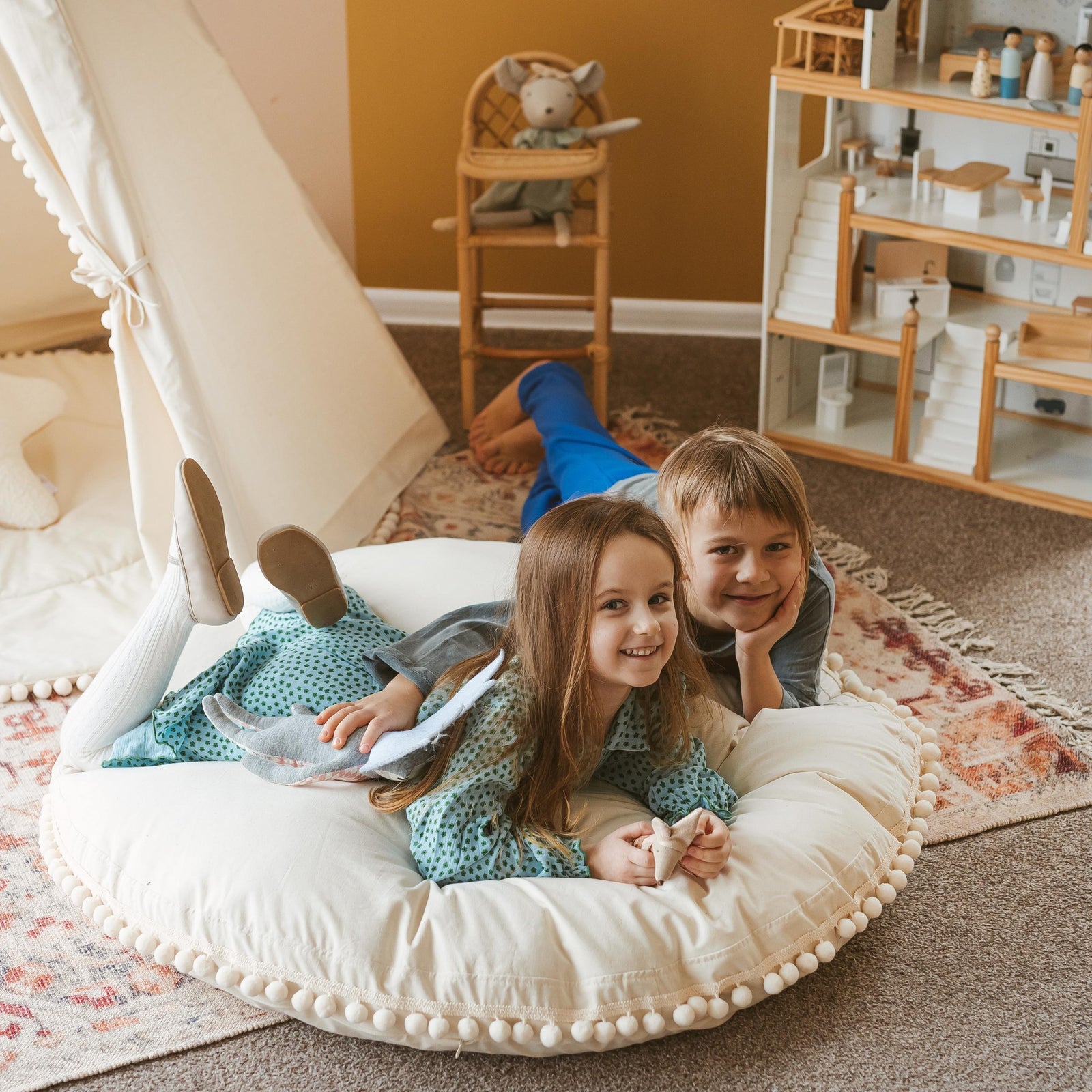 MINICAMP ecru pom pom floor cushion, product photograph
