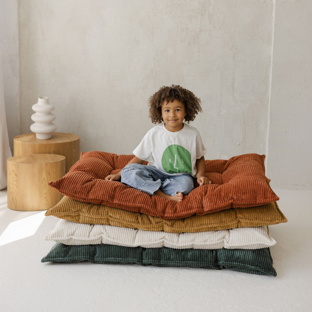 MINICAMP terracotta tufted floor cushion, close product view