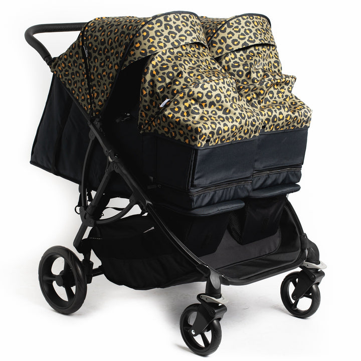 Roma Gemini 2 pushchair fitted with two Khaki Leopard carry cots for twins