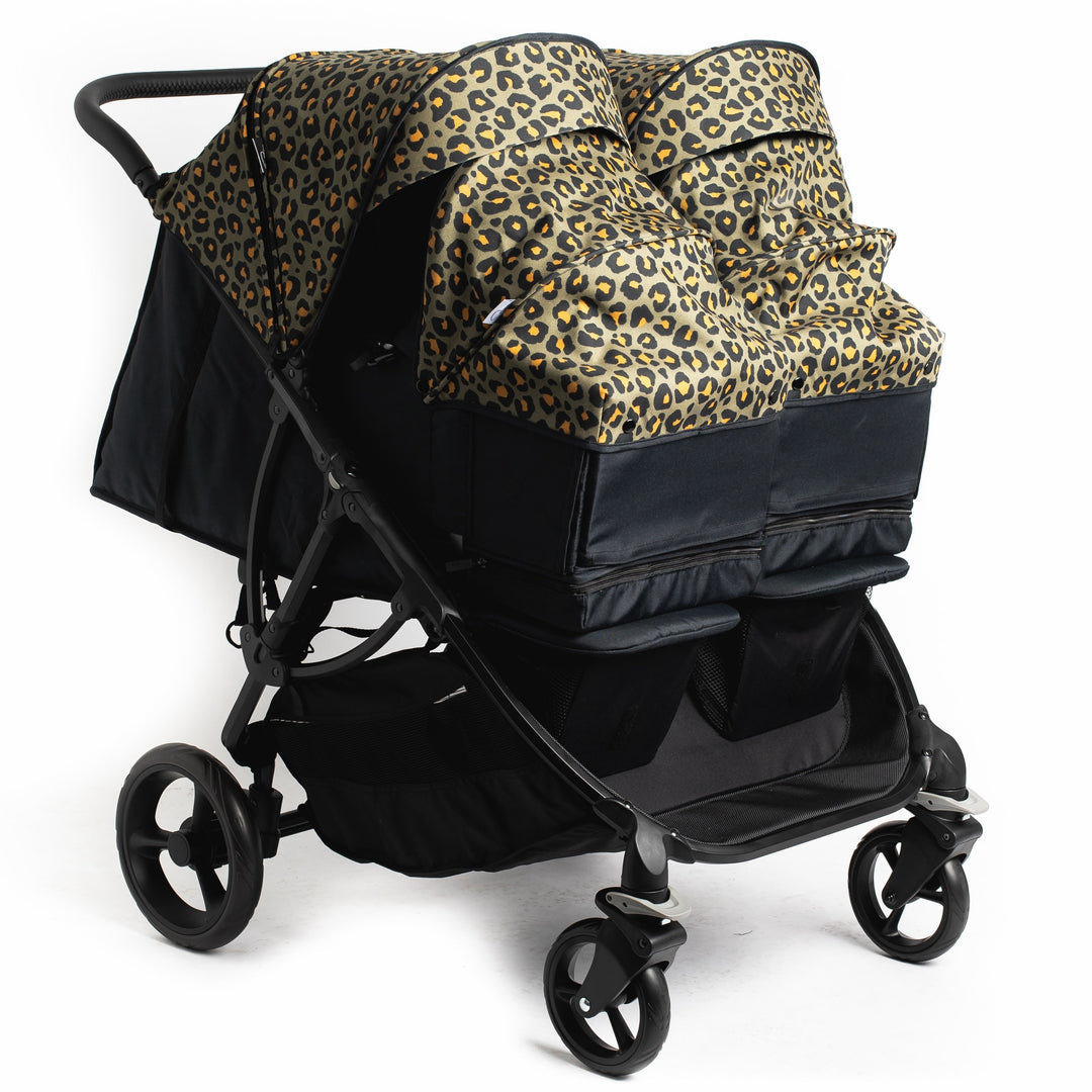 Roma Gemini 2 double pushchair in Khaki Leopard fitted with two carry cots for twins