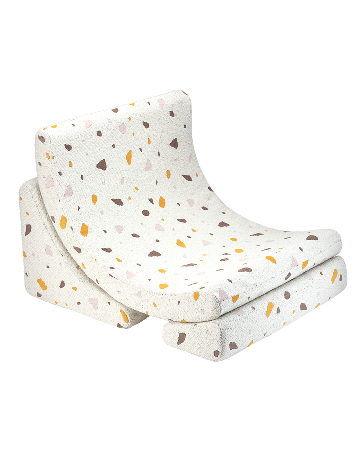 Olive terrazzo Moon Chair with orange and pink speckle pattern