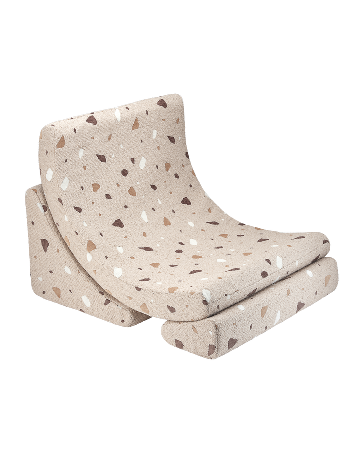 Tan corduroy ribbed Moon Chair with footstool, flat white background