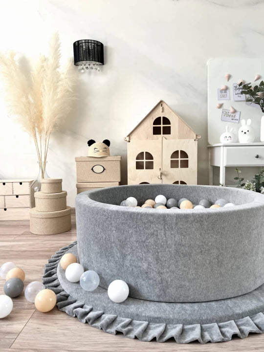 Monio for Kids Grey Velvet Round Ball Pit — lifestyle image in nursery setting