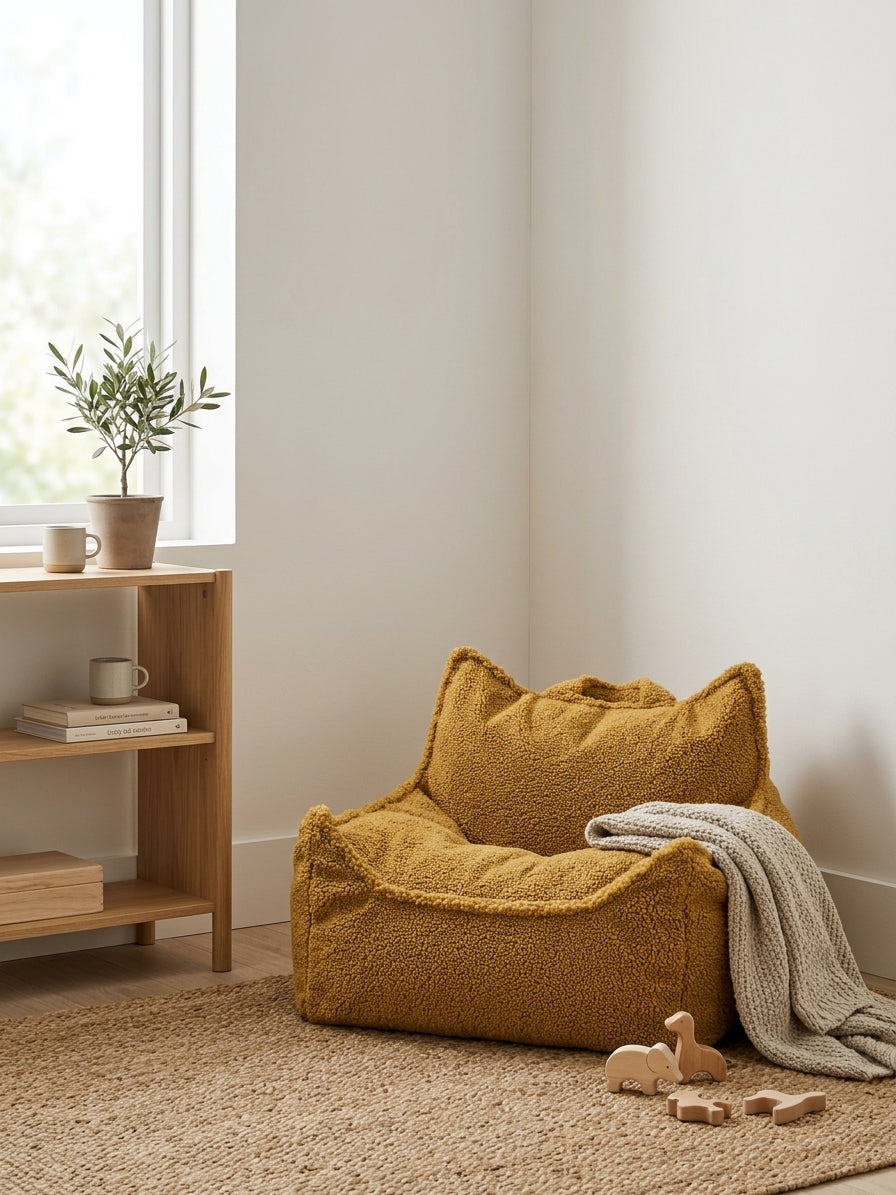 Wigiwama corduroy bean bag chair in a relaxed low shape in a calm playroom corner