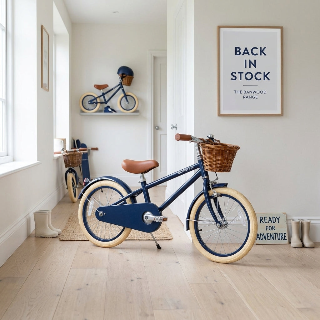 Banwood Classic Bicycle in Navy shown parked in a bright, tidy setting representing the restored range
