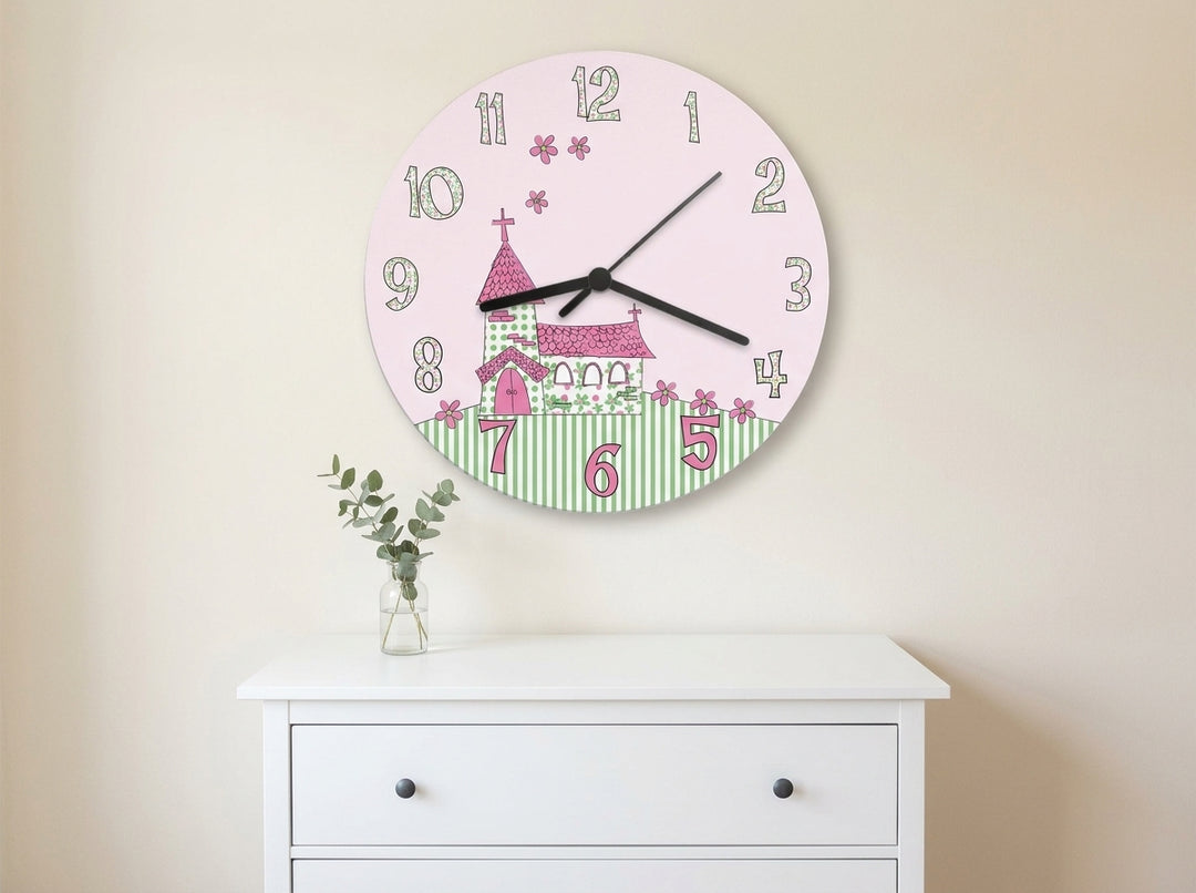 Personalised Whimsical Church Christening Clock with a pink church design hanging on a nursery wall