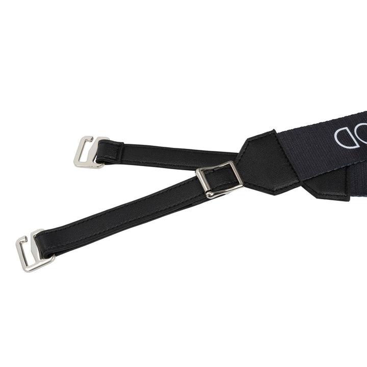 Black carry strap hardware close-up showing metal buckles and attachment points
