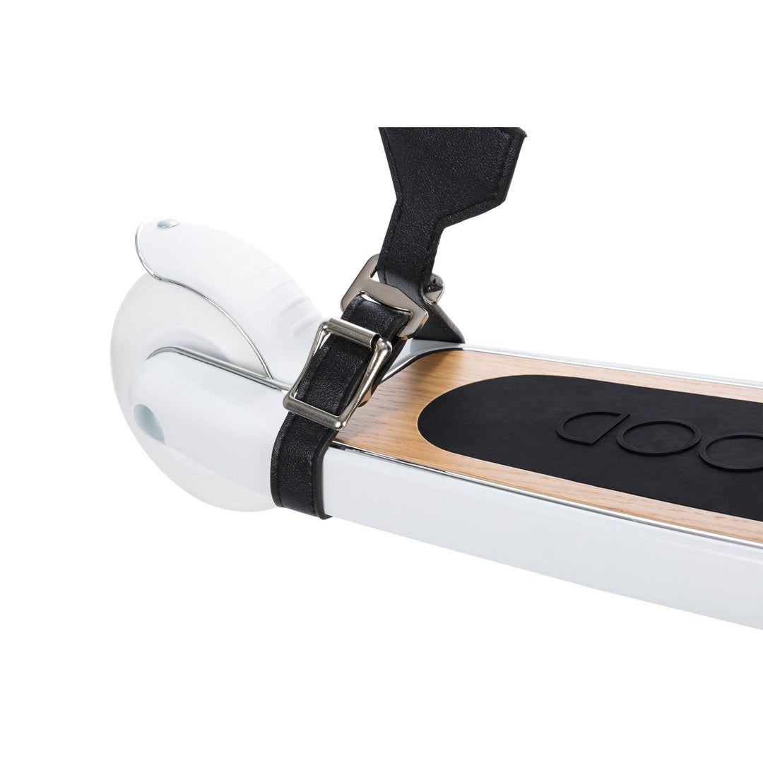 White scooter deck with carry strap secured across using metal buckle attachment