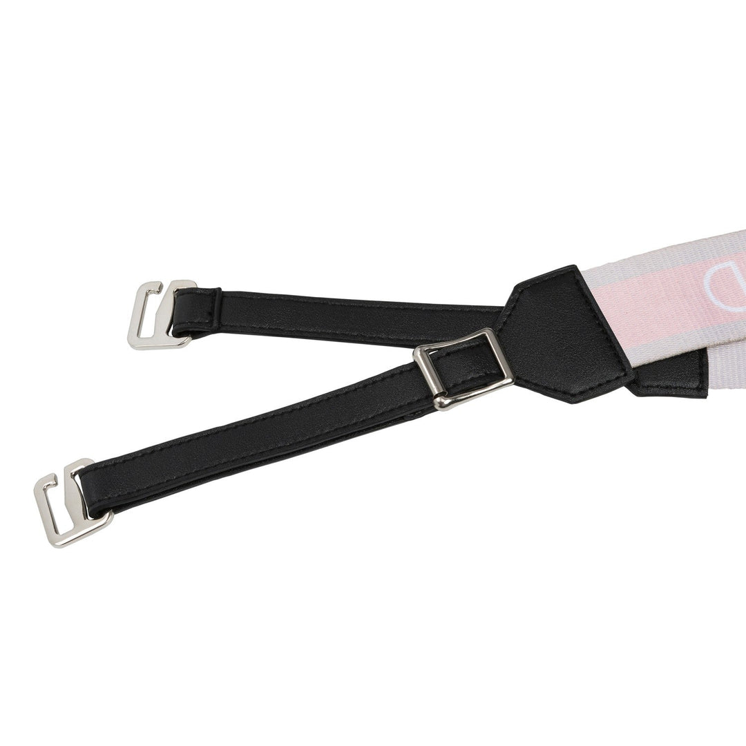 Black leather shoulder pad detail with metal D-ring buckle