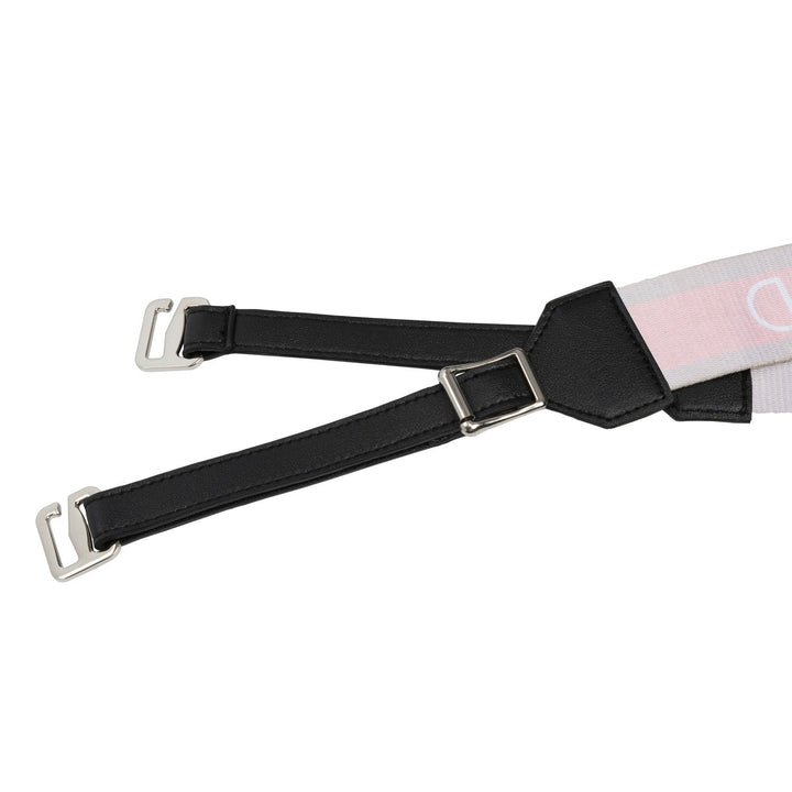 Black leather shoulder pad detail with metal D-ring buckle