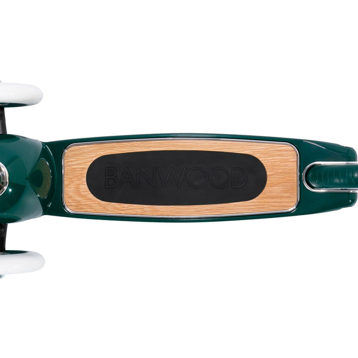 Close-up of Banwood branded wooden handlebar grip at angle
