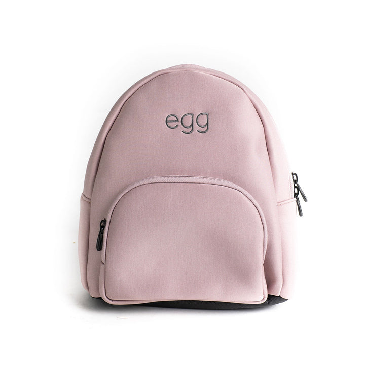 Roma Egg® Dolls Pram Bag in Hush Violet, front view of the backpack with embroidered egg logo and front zip pocket
