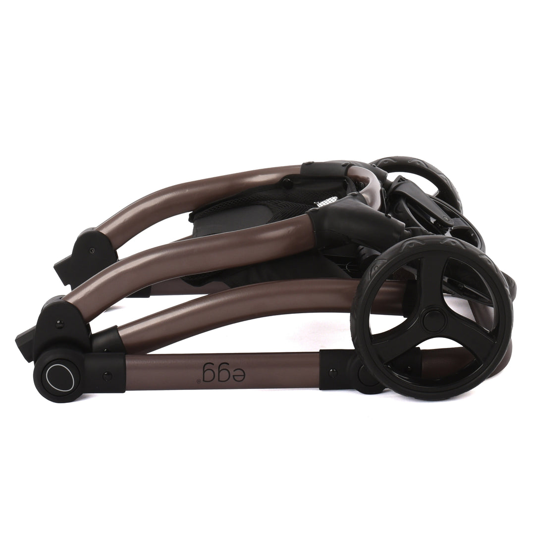 Roma Egg® Dolls Pram in Mulberry, additional view of the toy pram