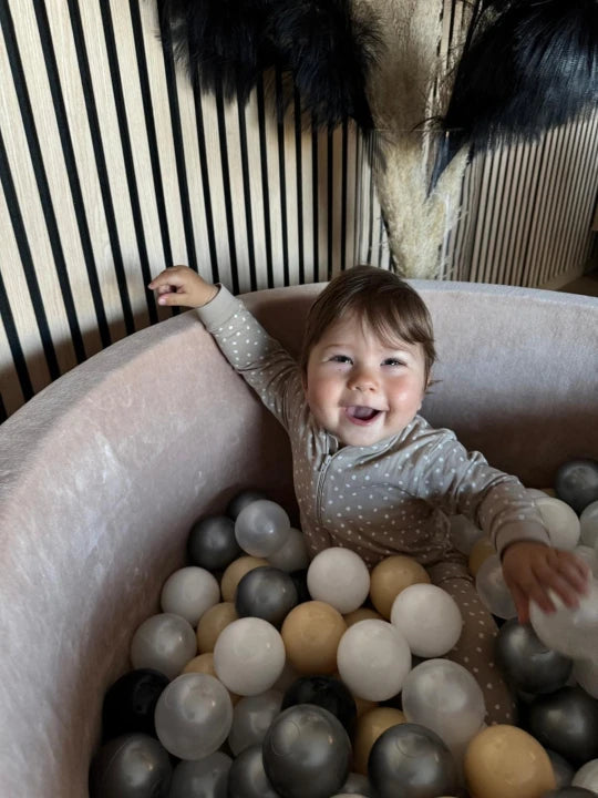 Monio for Kids Beige Velvet Round Ball Pit — lifestyle image in nursery setting
