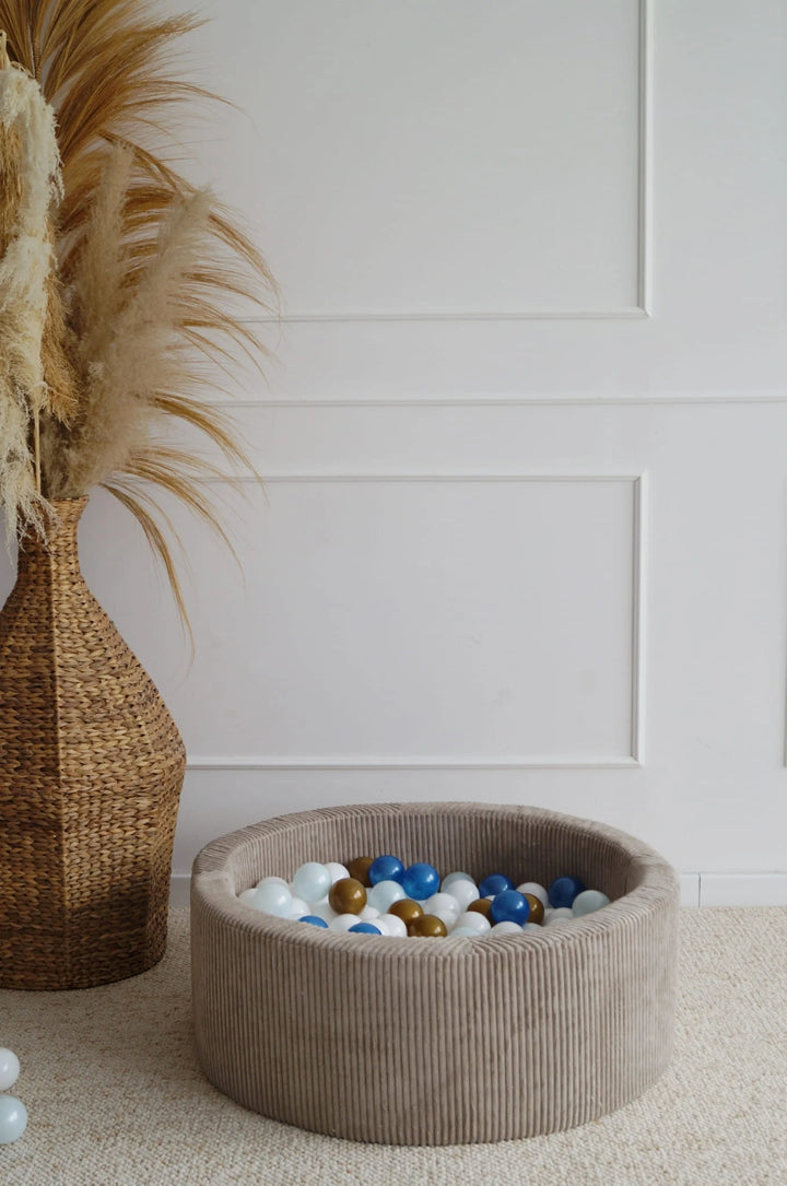 Monio for Kids Beige Corduroy Round Ball Pit — lifestyle image in neutral nursery